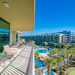 Discover the pool area with a refreshing lazy river and thrilling waterslide, just steps from the bay