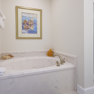Relax in the roomy jetted tub, take in the framed coastal art, and unwind after a day at the beach