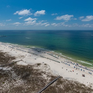 Relax on the balcony, soaking in picturesque coast views and the gentle sounds of the waves lapping the shore
