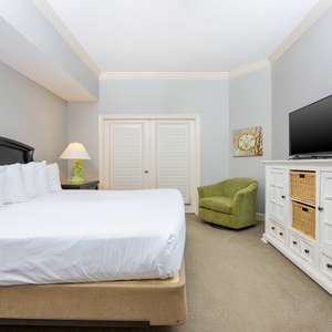 Sink into the plush comfort of the king master suite, ready to unwind and catch up on your favorite shows