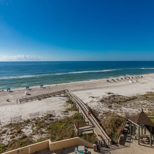 This image showcases a breathtaking beach view with inviting lounge chairs and a serene atmosphere perfect for relaxation