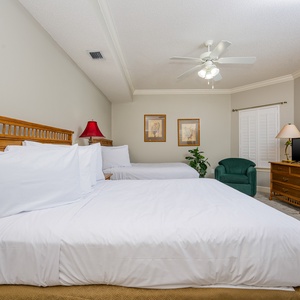 Relax on one of the cozy double beds in this guest suite and enjoy a peaceful slumber
