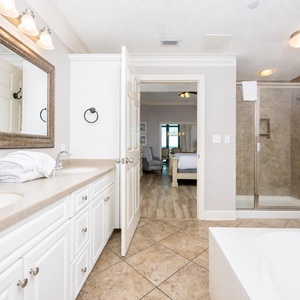 Indulge in relaxation in the master bath with a refreshing walk-in shower and soothing jetted tub