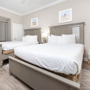 Relax on one of the cozy queen beds in this guest suite and enjoy a peaceful slumber