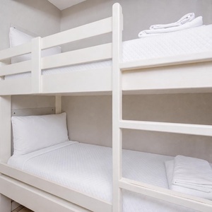 Cozy bunk area in the hallway for kids to enjoy relaxing after a day of adventure