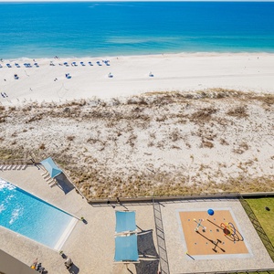 Take a refreshing dip in the gradual entry pool while enjoying views of the beach and vibrant outdoor activities nearby