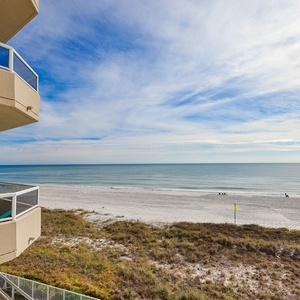 Enjoy a breathtaking beachfront view from the balcony, perfect for relaxation and sunset watching