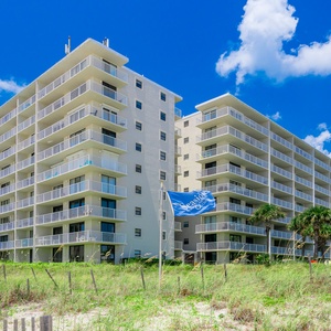Experience a beachfront vacation at Seaside Beach & Racquet Club with inviting amenities and breathtaking balcony views