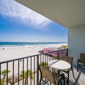 Your balcony invites you to savor the endless blue horizon and lively beach below