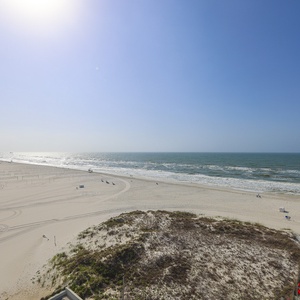 Enjoy stunning beachfront views and a serene atmosphere from this inviting space, perfect for relaxation and leisure