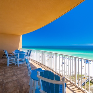 Imagine sipping your favorite drink while feeling the sun's gentle warmth on your beachfront balcony