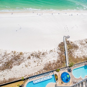 Experience seemingly endless coastline views of the horizon as waves lap the shore and the sun glistens over the water