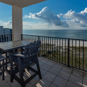Balcony offers a serene view of the beach and gulf, perfect for enjoying morning coffee or evening sunsets