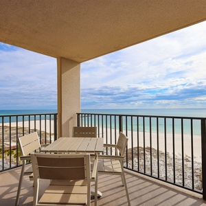 Relax on the balcony while taking in the expansive views of the tranquil waters and shoreline