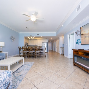 Settle into the living room sofa to watch your favorite shows while the electric fireplace adds gentle heat