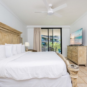Retreat to the king master suite with cozy bedding and drift off to coastal sights and sounds of the bay