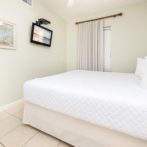 Drift into a peaceful night in this guest suite on the king bed, with a cozy vibe enhanced by charming coastal decor