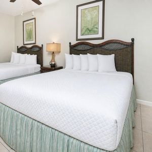Drift into restful nights in this queen guest suite, while the soothing decor enhances your cozy beach retreat