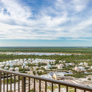 Enjoy stunning views of the state park and charming coastal homes from this inviting balcony, perfect for relaxation