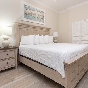 Relax in this king master suite, read beneath a warm lamp, and surround yourself with fluffy pillows