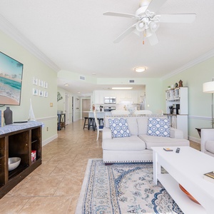 Relax on the comfortable sofa, enjoying the coastal decor and a large TV for your entertainment