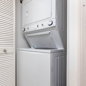 Conveniently access the in-unit washer and dryer for easy laundry during your stay