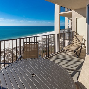 Relax on the balcony, enjoying the expansive views and gentle gulf breeze