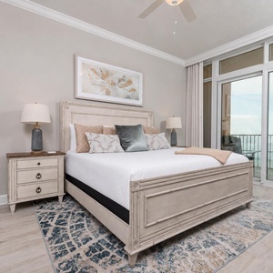 Retreat to this king master suite and relax with soft bedding and beachfront balcony access