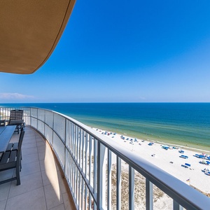 Step onto your balcony and feel warm gulf air as umbrellas dot the beachfront below