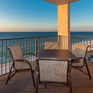 Savor your morning coffee at the outdoor table while enjoying expansive views of the tranquil waters and shoreline