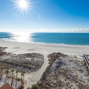 Bask in the sun with stunning views of the tranquil waters and beach from your beachfront balcony