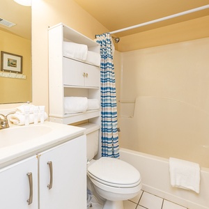 Tub/Shower combination and vanity in the guest bathroom for extra guests