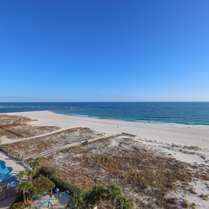 Enjoy breathtaking views of the coastline and a pool area, perfect for relaxation and fun under the sun