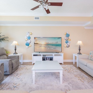 Gather with the family for movie night or stream your favorite show in this inviting living space