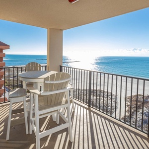 Enjoy meals or drinks while taking in the beautiful water views from this inviting balcony