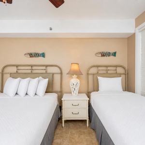 Guest suite with a queen and a twin invites restful nights after your day on the shore