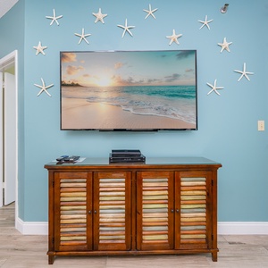 Relax and stream your favorite shows while enjoying the coastal decor and inviting vibe of your space