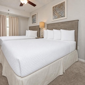 Relax on one of the cozy double beds in this guest suite and enjoy a peaceful slumber