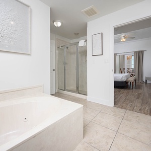 Indulge in relaxation in the master bath with a refreshing walk-in shower and soothing jetted tub