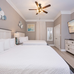 Unwind after a beach day in this guest room with two queen beds and stream your favorite shows
