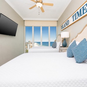 Discover the stunning colors of a gulf coast sunrise from this queen guest suite and get ready for a beach day