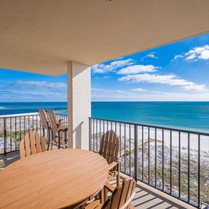 Savor the view from the balcony, perfect for enjoying the tranquil waters and blue skies