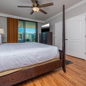 Unwind after a fun vacation day and stream your favorite shows in the king master suite with balcony access