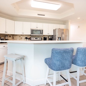 Sip your morning coffee at the breakfast bar and get ready for a day of adventure in this stylish space