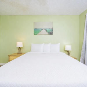 Rest in the guest suite with a double bed while watching the blue sky outside your window