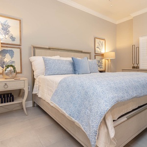 Retreat to the king master suite with cozy bedding and drift off into a peaceful slumber
