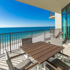 Relax and take in sweeping coastal views while unwinding on your balcony