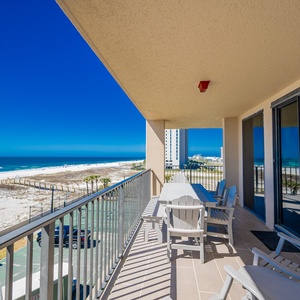 Savor meals at the spacious table while enjoying the refreshing coastal breeze and beautiful views from your balcony