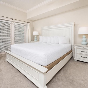 Sink into the plush king bed and relish a peaceful night's rest in this inviting master suite