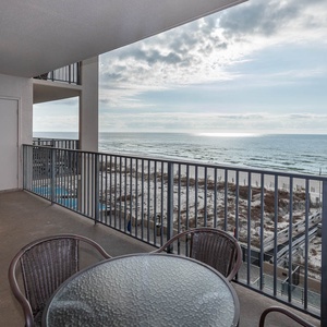 Savor the fresh gulf air on the balcony, perfect for sipping morning coffee while taking in the tranquil beach views